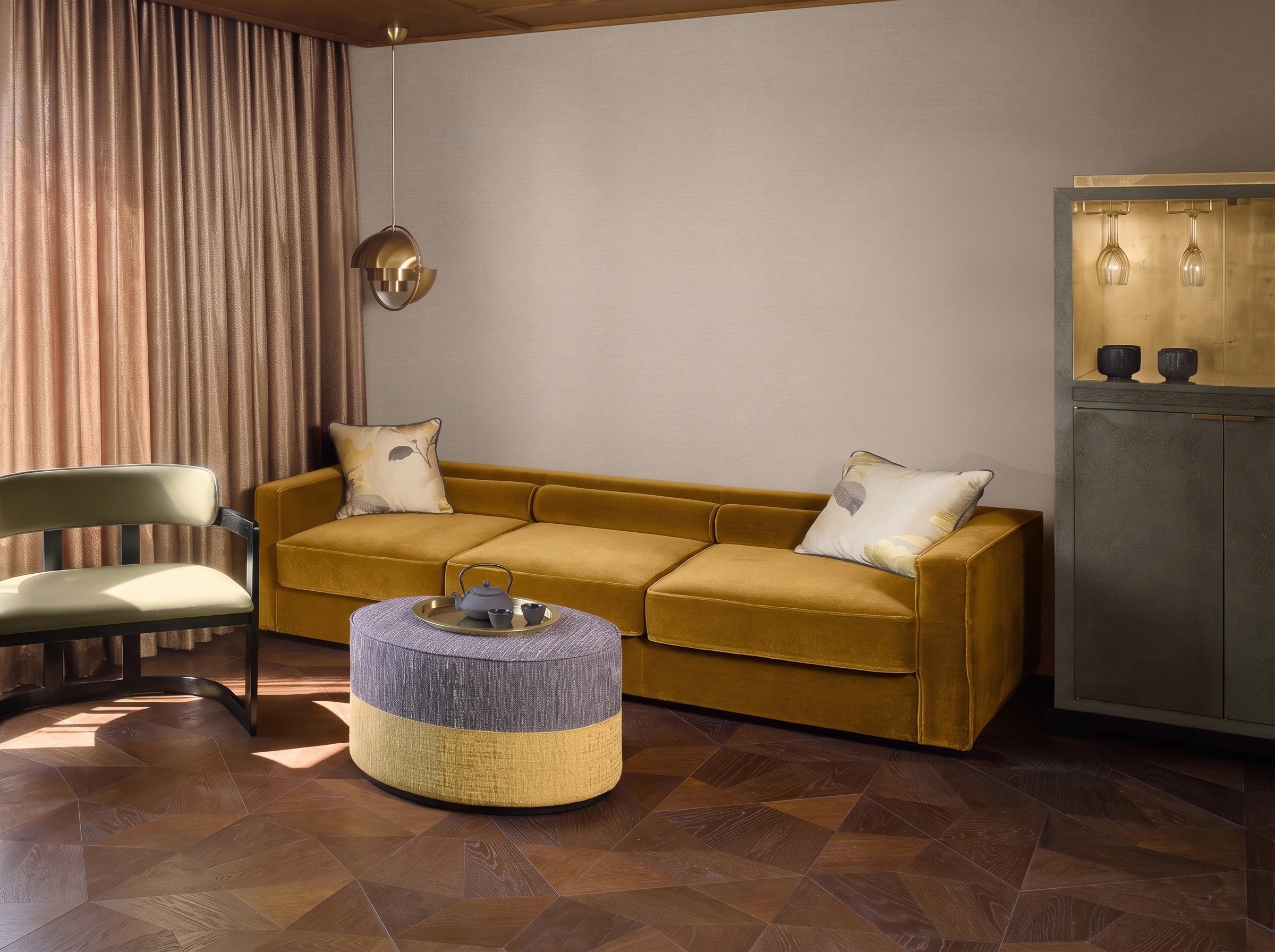 Foglie d'Oro Versailles parquet beneath a mustard velvet sofa