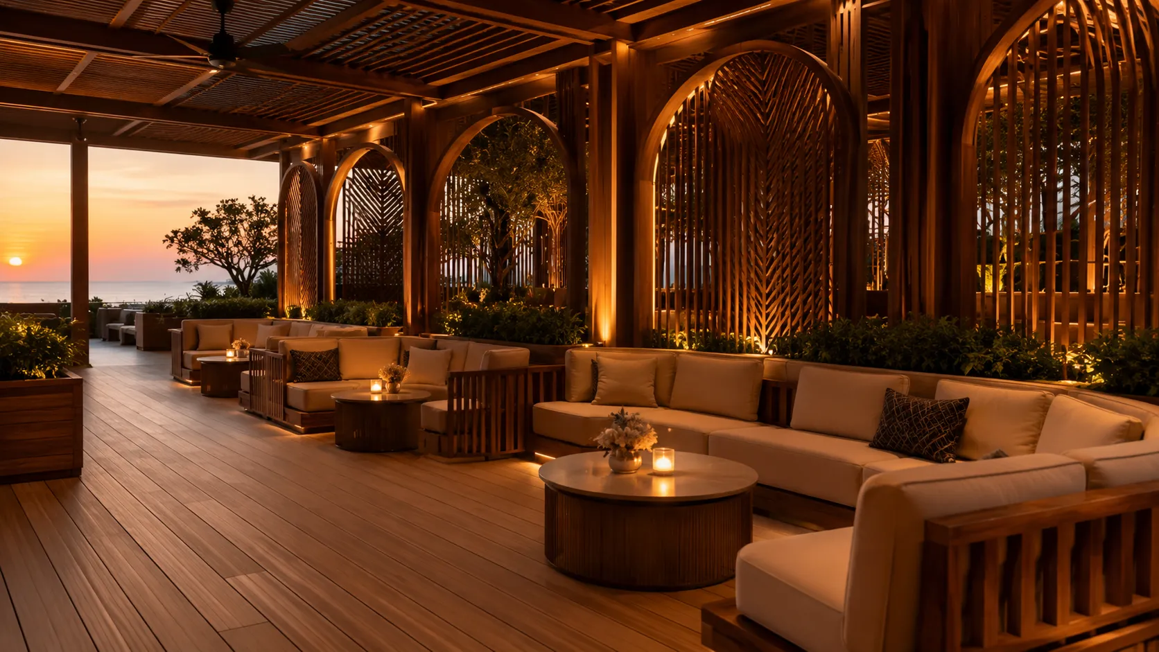 An elegant event lounge with crafted-wood banquettes on warm decking