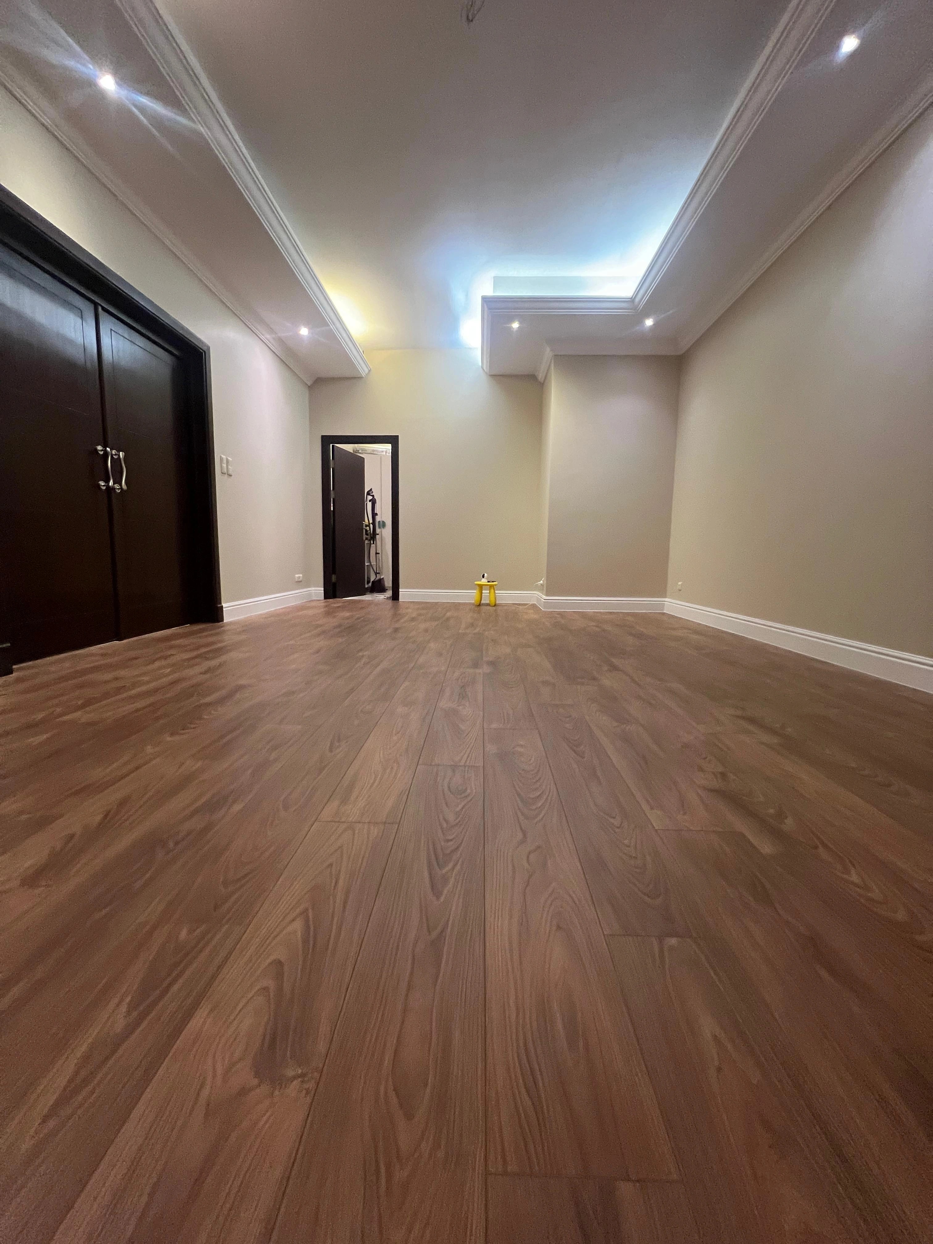 A quiet private room completed in warm natural oak
