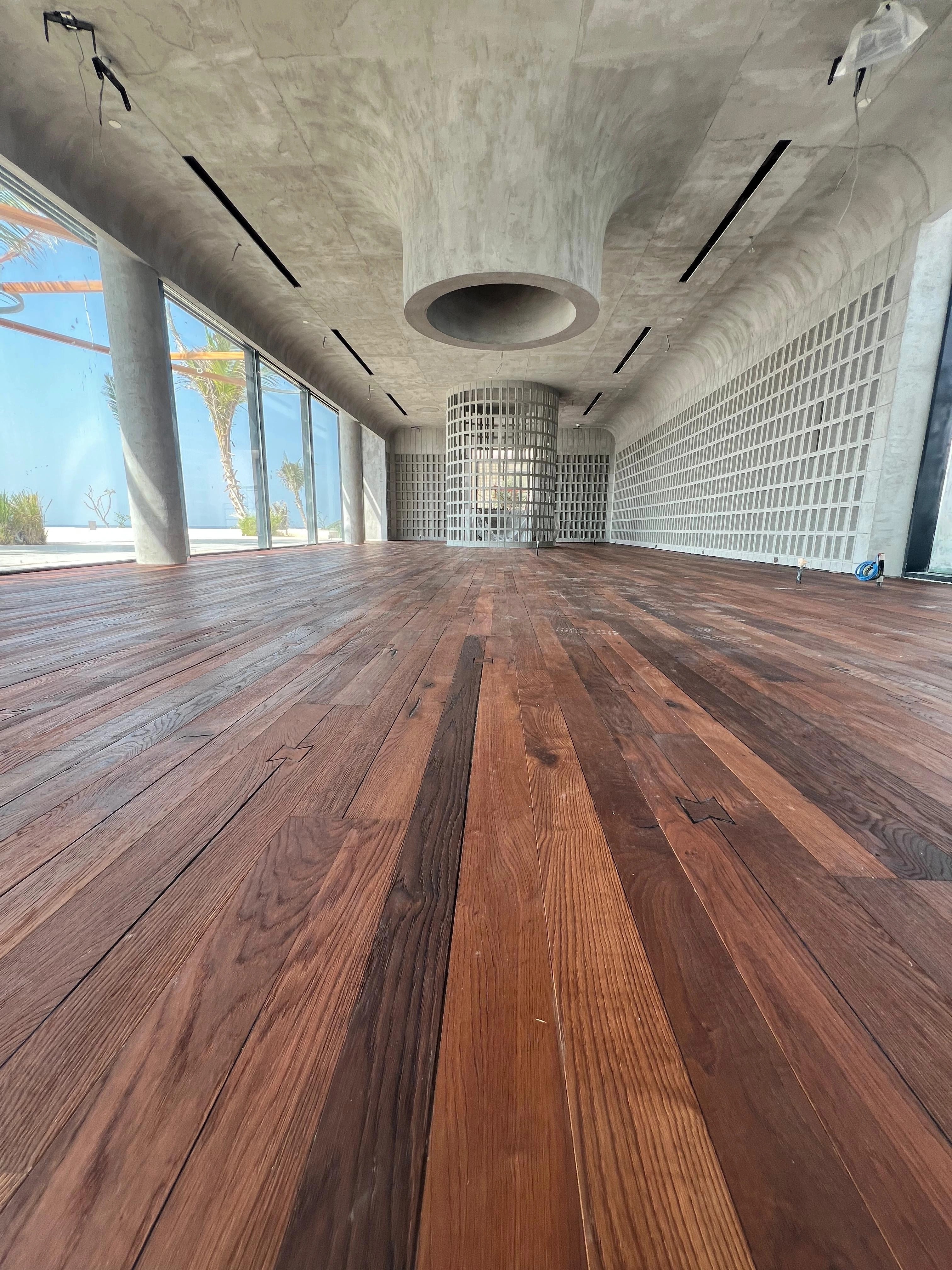 The restaurant floor carrying a continuous line through the interior